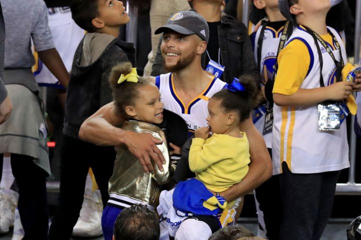 Stephen Curry and Riley Curry