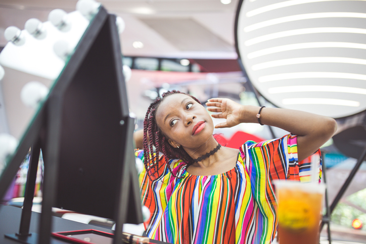 Fashionable Woman In Make Up Store