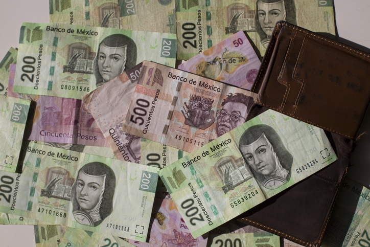 Mexican pesos and wallet