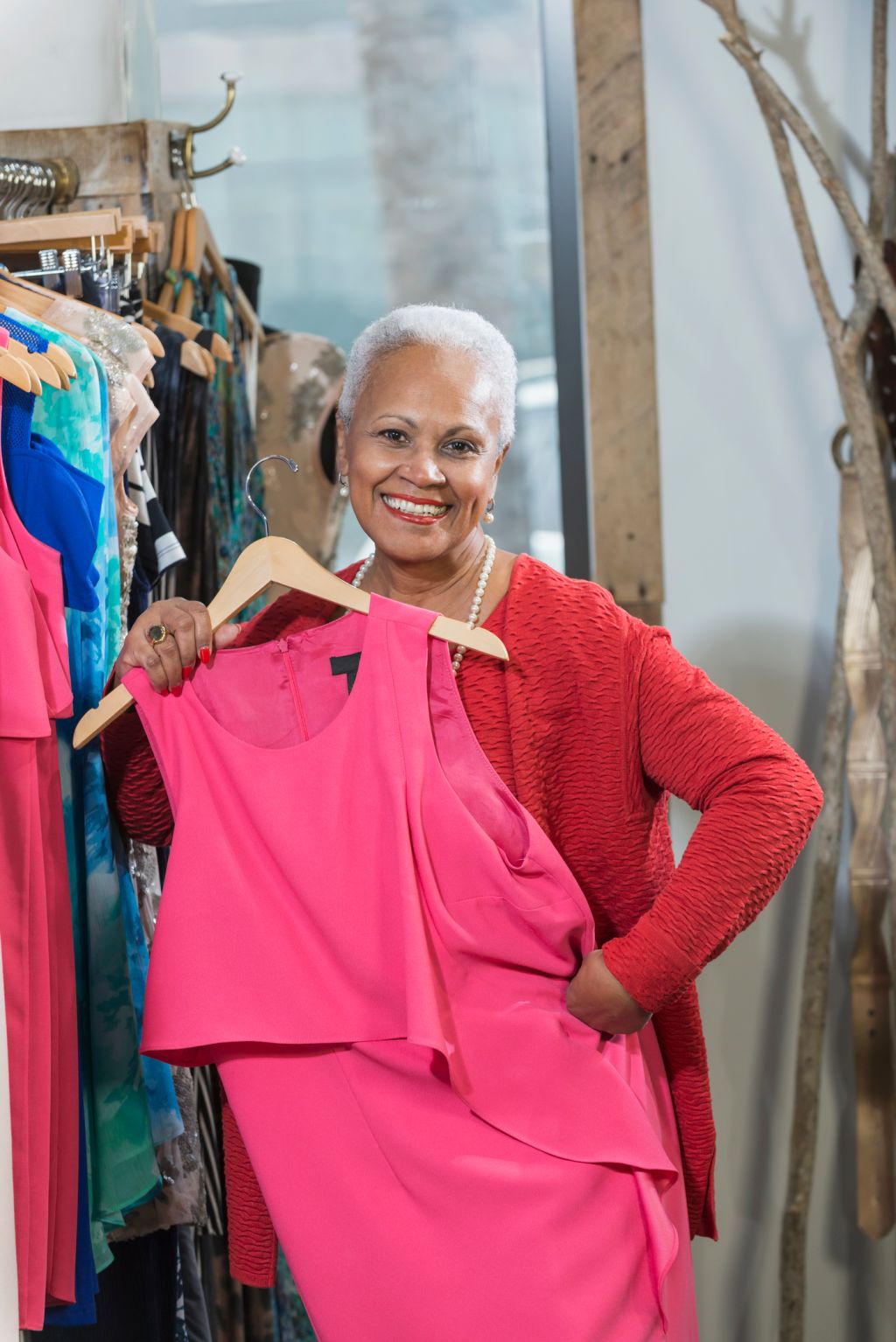 Mature black woman shopping in a clothing store