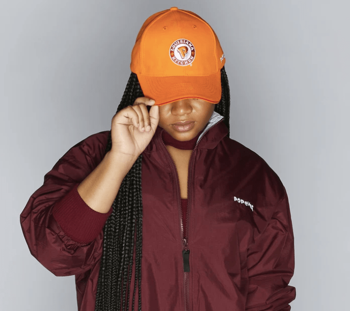 POPEYES UNIFORM ORANGE CAP ($20)