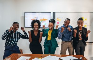 Portrait Of Happy Young Business Team