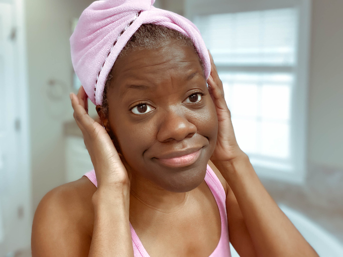 Woman Wears Microfiber Wrap to Dry Hair After Washing