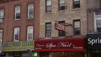 Store signs and canopies in the district of Sunset Park, in Brooklyn, New York City