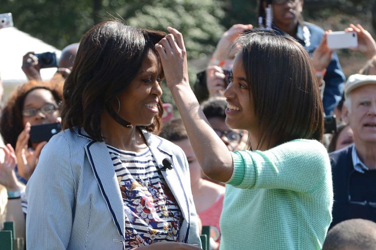 Malia Fixing Her Mama's Hair