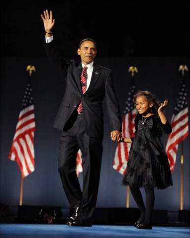 Senator Barack Obama and his daughter Sasha on election nigh