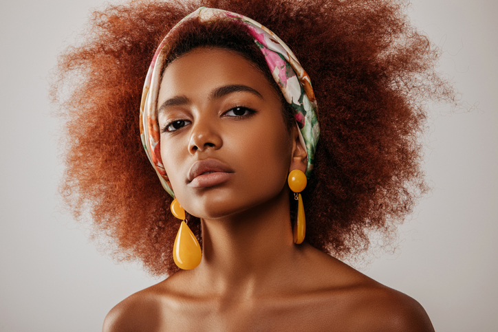 Beautiful afro girl with earrings