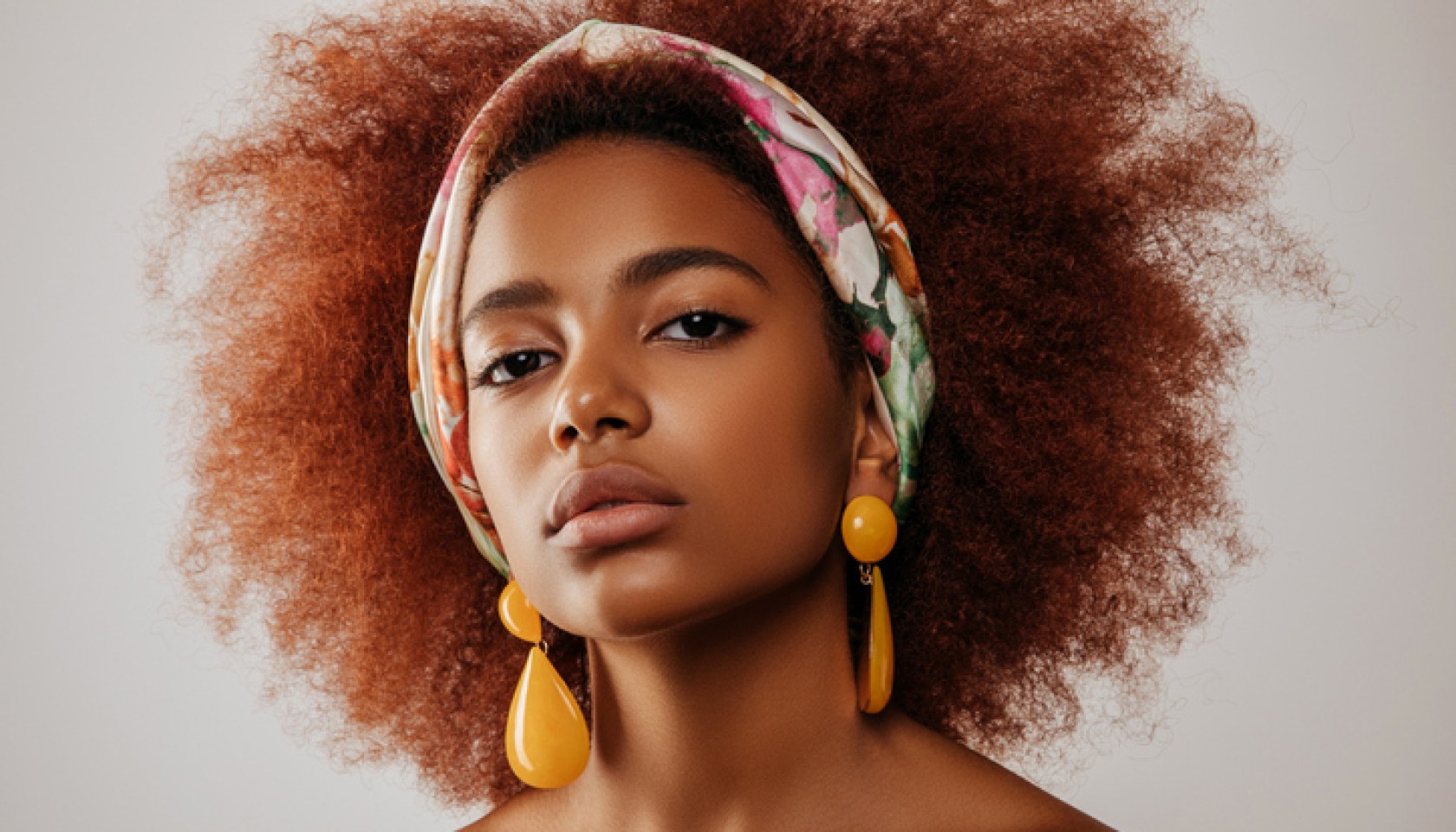 Beautiful afro girl with earrings