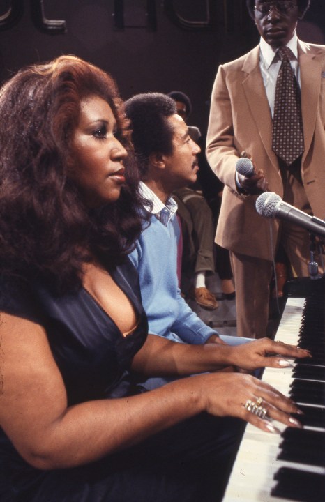 Aretha Franklin and Smokey Robinson are seated at the piano and being interviewed by Don Cornelius after performing a live version of ""Ooo Baby Baby"" together on Soul Train.