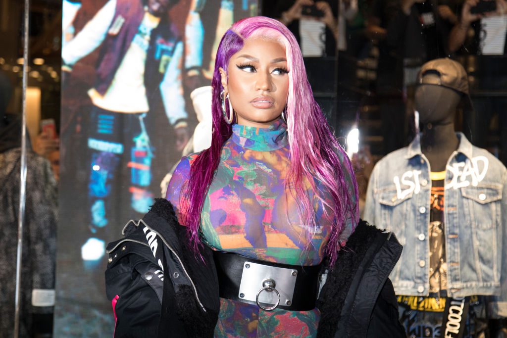 Stats of Minaj on X: Nicki Minaj wearing her chanel bags is a mood. 🥰   / X
