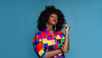 Fashionable woman in colorful shirt