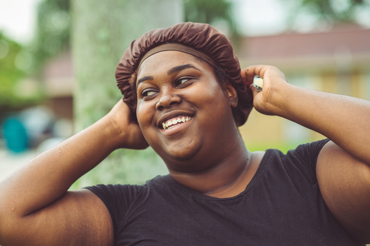 African American woman in a hair cap