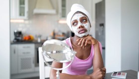 Beautiful woman at home having skin care routine. Concept of natural cosmetics skin care.