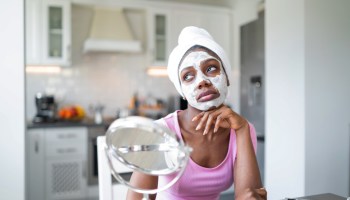 Beautiful woman at home having skin care routine. Concept of natural cosmetics skin care.