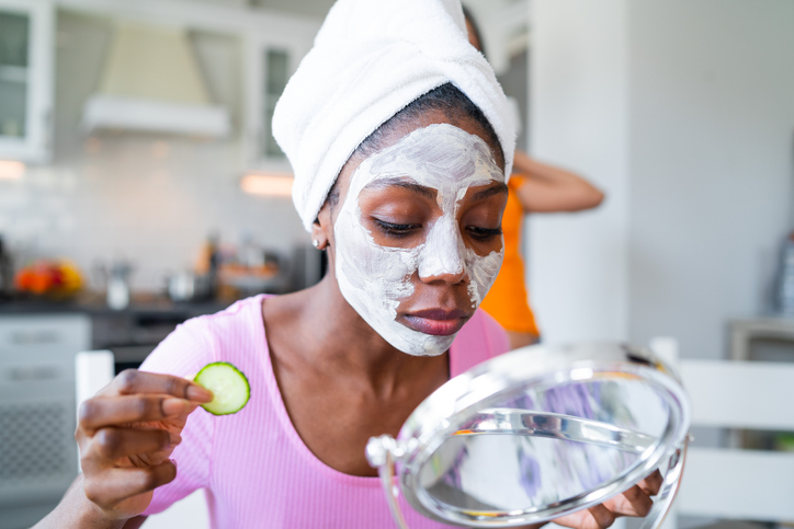 Beautiful woman at home having skin care routine. Concept of natural cosmetics skin care.