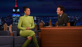 Alicia Keys seated on stage in green dress with Jimmy Fallon on The Tonight Show Starring Jimmy Fallon - Season 9