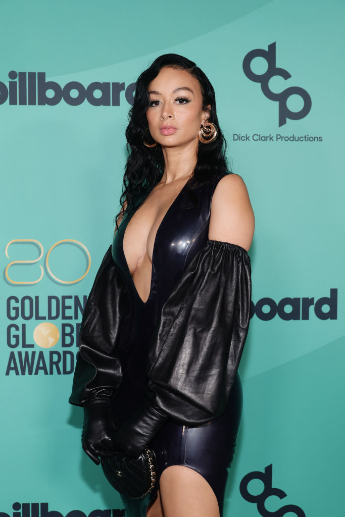 Draya Michele shows off her womanly curves in a teal-blue