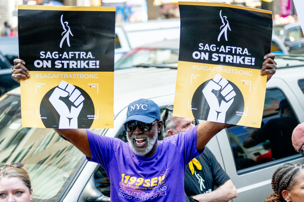 SAG-AFTRA Members Hold "Rock The City For A Fair Contract" Rally In Times Square- WGA strike