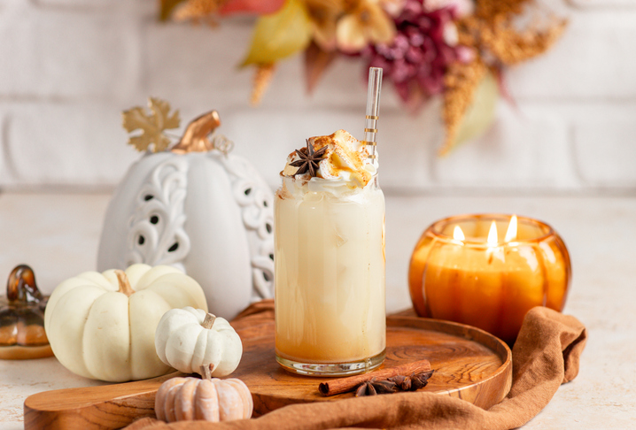 Pumpkin Spice Latte Drink Milkshake with cream and cinnamon - world candle month