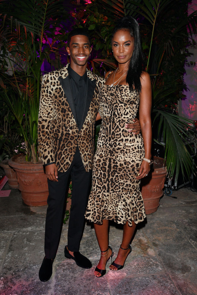 Kim Porter and Christian Combs' at the Dolce & Gabbana Queen Of Hearts Party