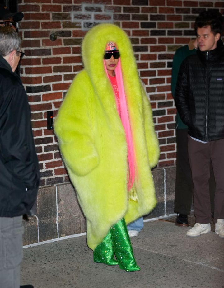 Nicki trades her pink fur for lime green.