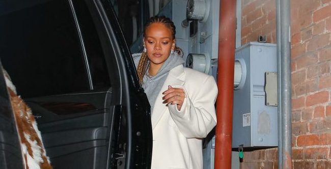 Rihanna Rocks Hip-Length Blonde Braids While Vacationing In Aspen