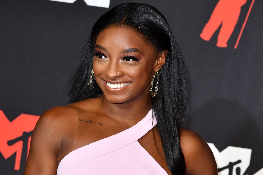 simone biles. vanity fair article. picture is of simone biles on the red carpet