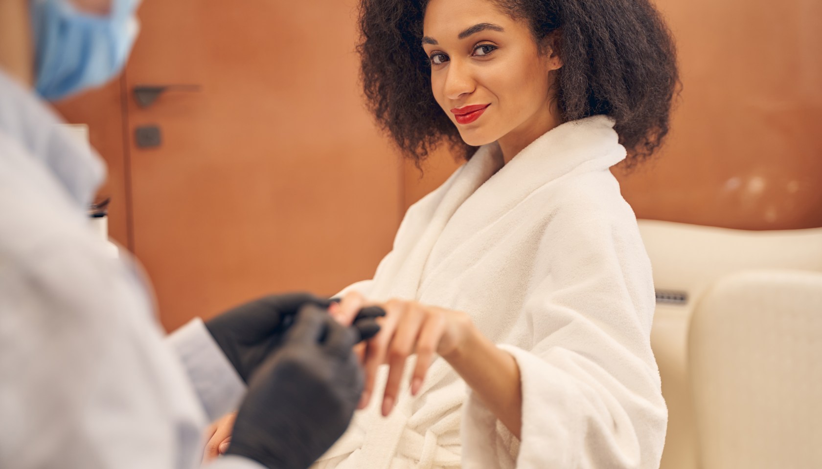 A woman getting a manicure
