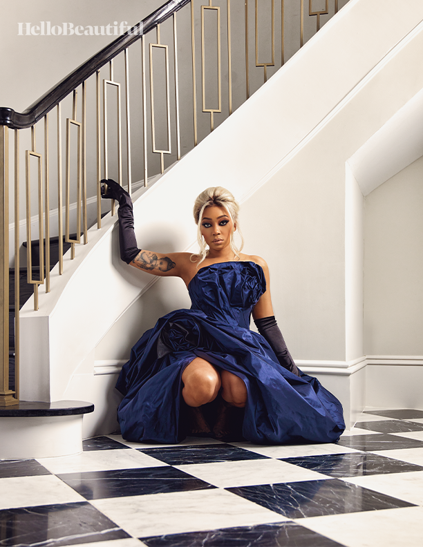 Monica poses in a blue dress for the Hello beautiful May 2024 cover issue