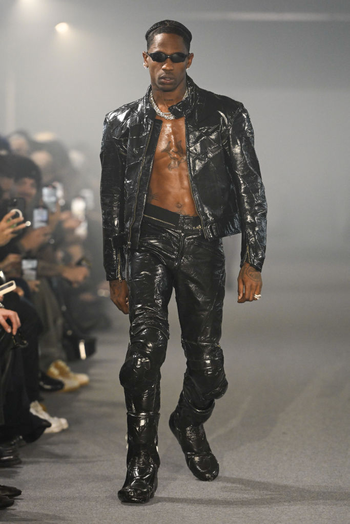 Travis Scott oozes sex appeal on the runway.