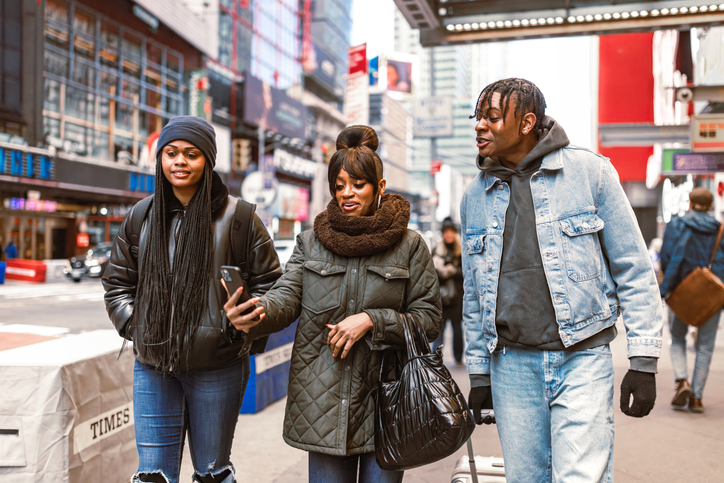 Busy City Street with Friends Chatting