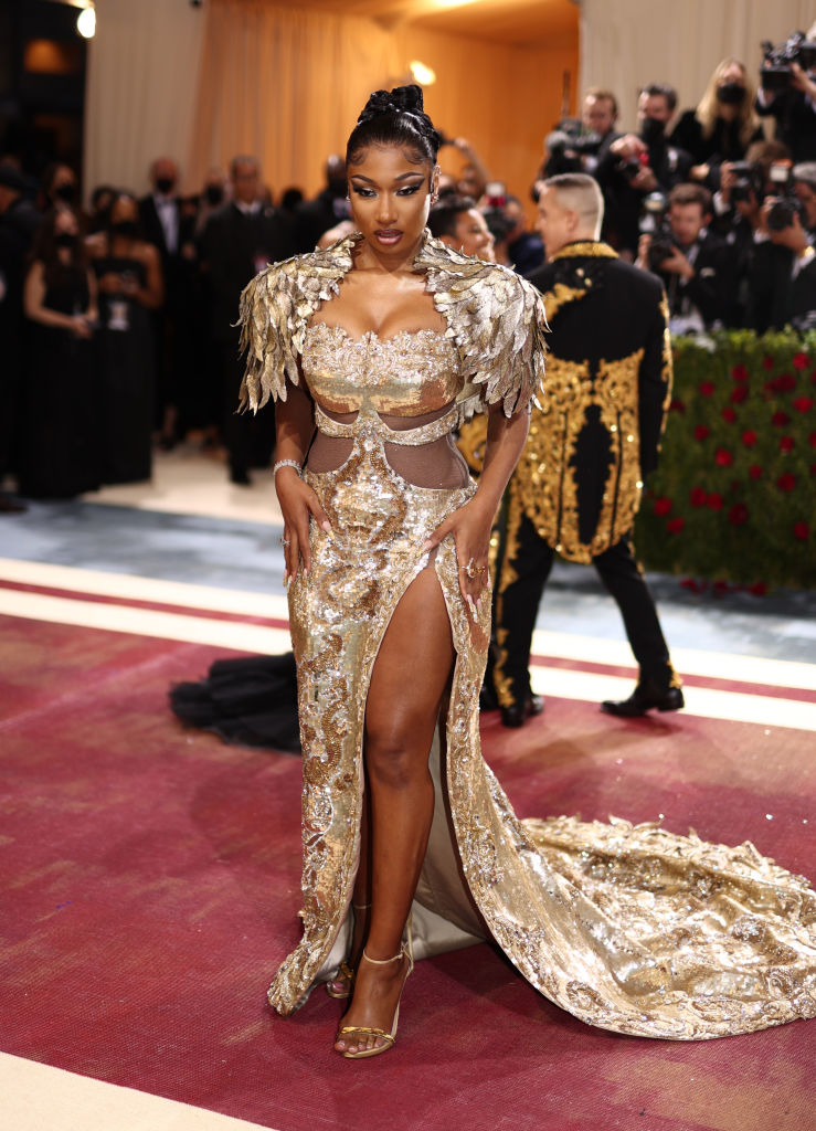 Megan Shines At The Met Gala In Gilded Gold
