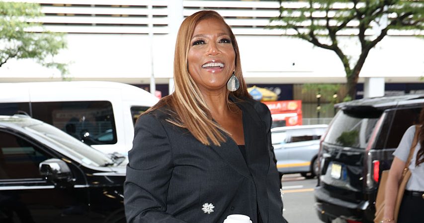 Queen Latifah‘s Burgundy Jumpsuit, Laid Edges, & Silk Press Slayed The Jennifer Hudson Show