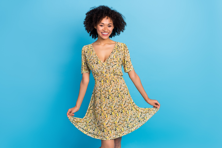 Portrait of attractive elegant girly cheerful wavy-haired girl posing dancing isolated over bright blue color background | Easter Outfit Inspo: Cute, Classy Ideas To Step Into Spring