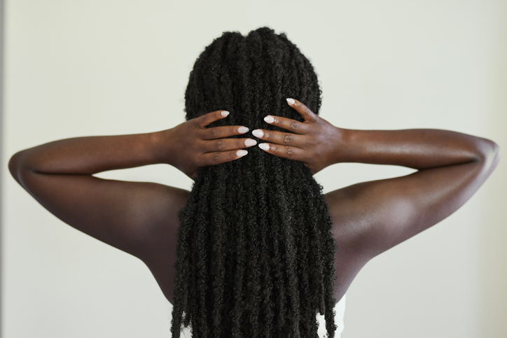 Back View of Woman with Long Black Textured Twists