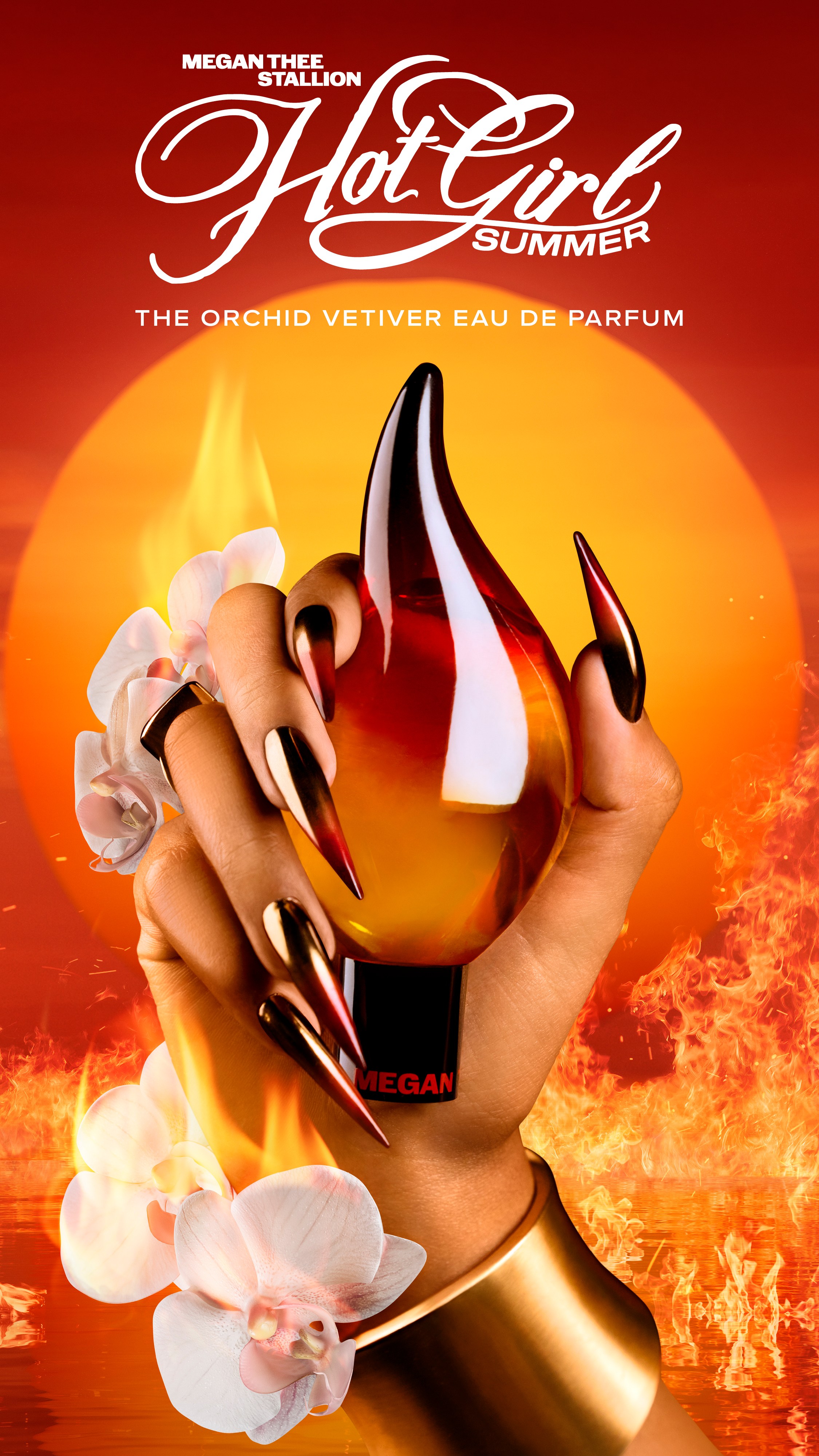 A close-up of a hand holding a glass bottle with an orchid-themed fragrance label against a fiery orange background.